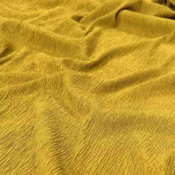 Bella Crepe Table Linen in Gold