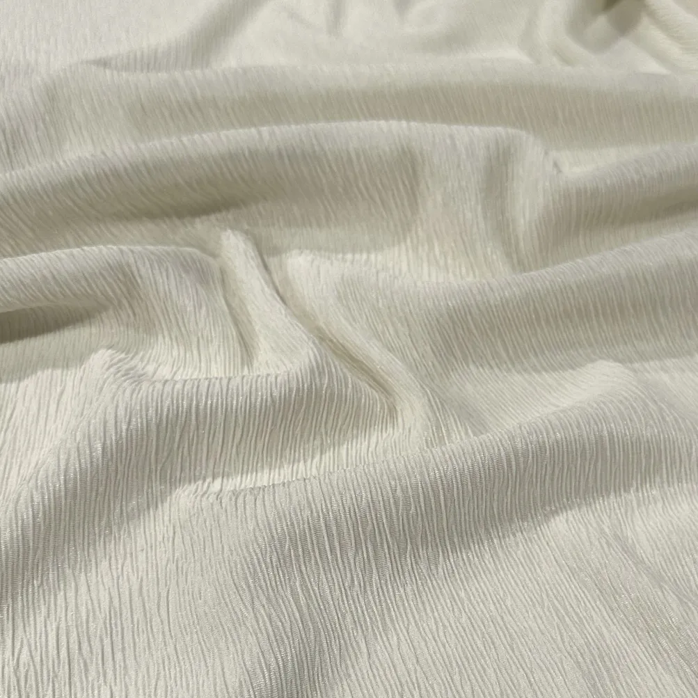 Bella Crepe Table Linen in Ivory