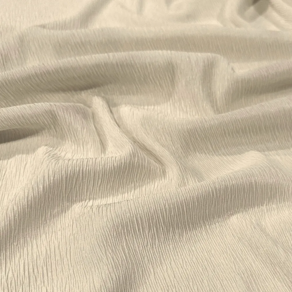 Bella Crepe Table Napkin in Bone
