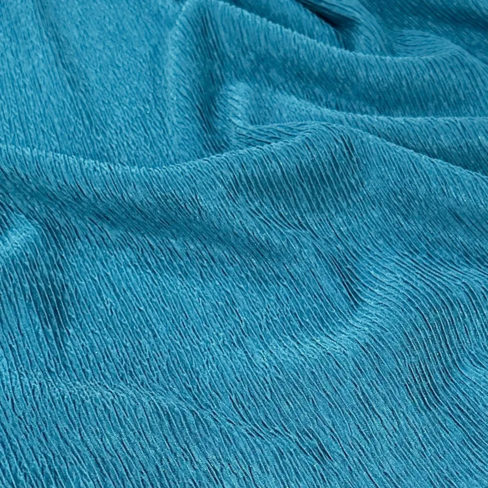 Bella Crepe Table Napkin in Turquoise