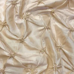Belly Button (Pinwheel) Table Linen in Champagne
