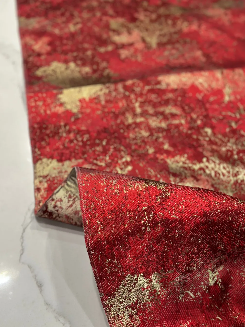 Cascade Jacquard Table Linen in Red and Gold