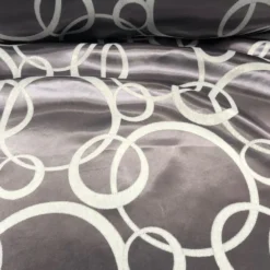 Cirque Jacquard (Reversible) Table Linen in Purple Grey