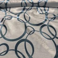 Cirque Jacquard (Reversible) Table Linen in Turquoise