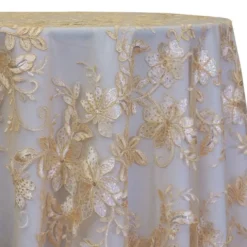 Claire Lace Table Linen in Champagne