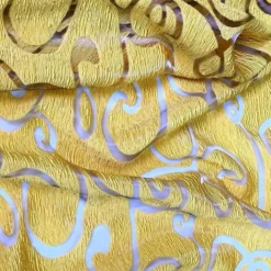 Contempo Scroll Sheer Table Linen in Gold