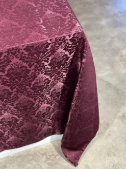 Damask Poly Table Linen in Burgundy