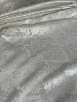Damask Poly Table Linen in Ivory