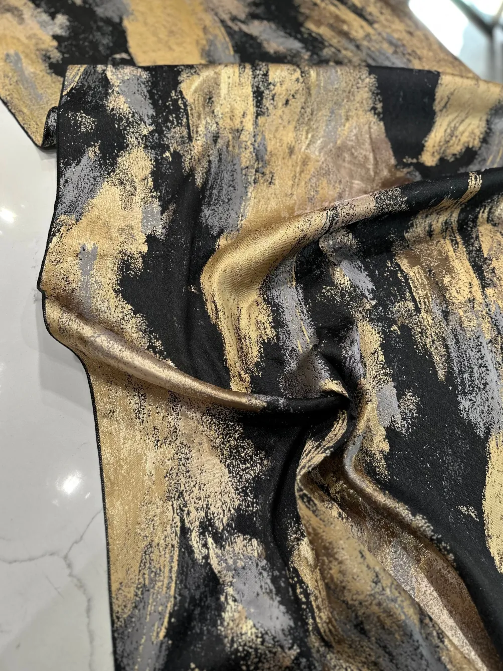 Element Jacquard Table Linen in Black and Gold