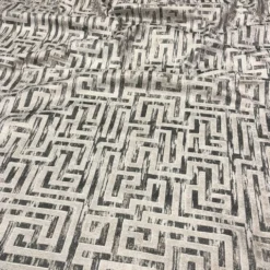 Gio Jacquard Table Linen in Taupe