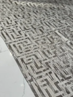 Gio Jacquard Table Linen in Taupe