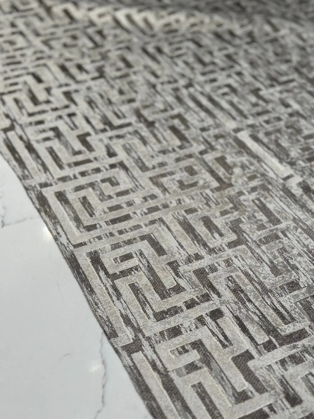 Gio Jacquard Table Linen in Taupe