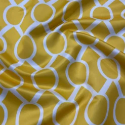 Halo Print (Lamour) Table Linen in Yellow