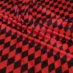 Harlequin Print (Lamour) Table Linen in Black and Red