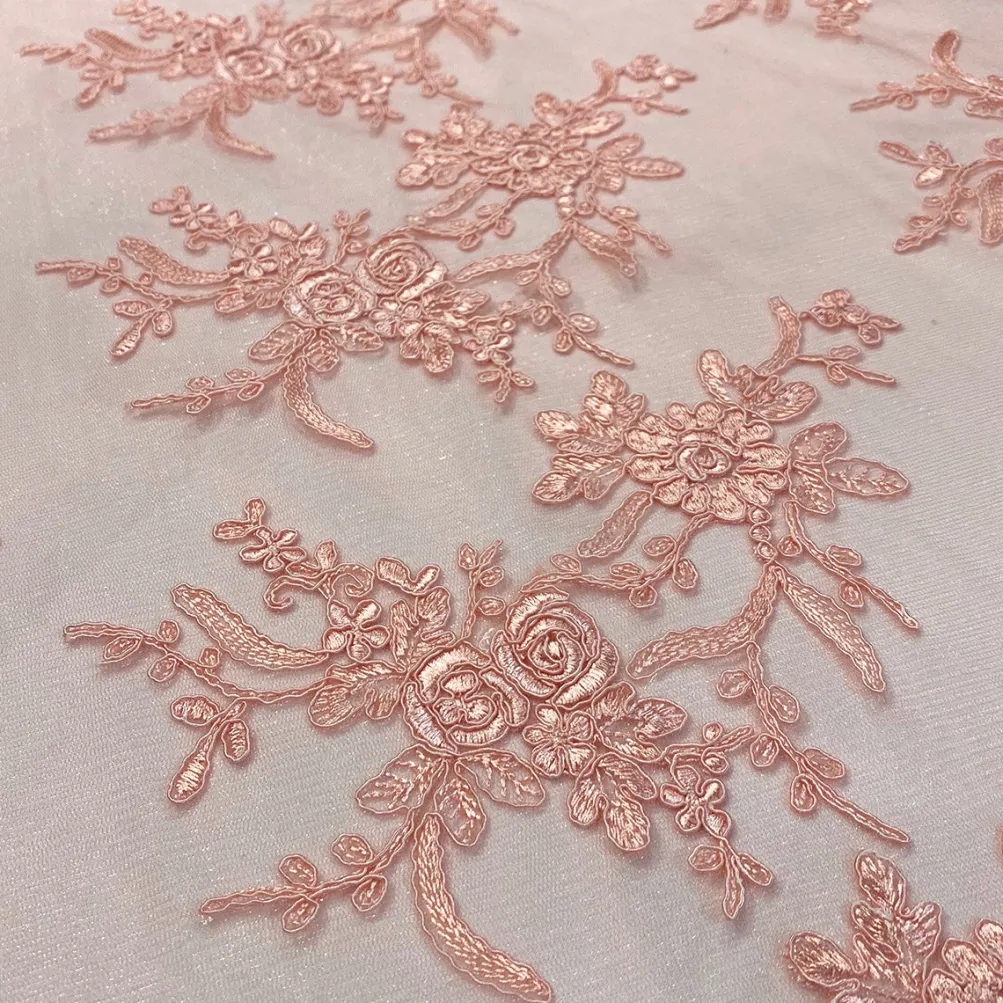 Laylani Lace Table Linen in Coral