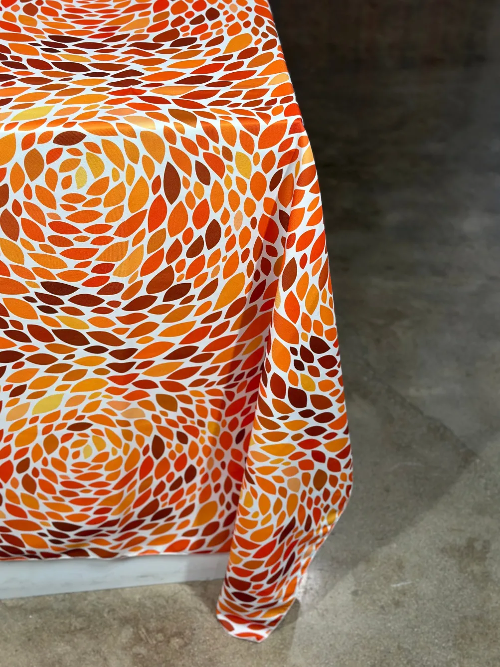 Locus Leaf (Poly Print) Table Linen in Orange