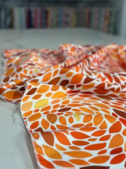 Locus Leaf (Poly Print) Table Linen in Orange