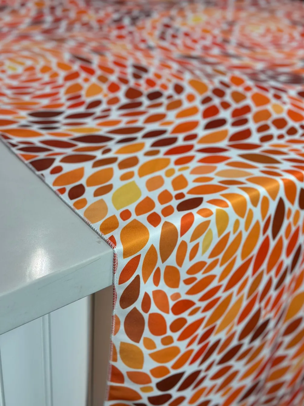 Locus Leaf (Poly Print) Table Linen in Orange