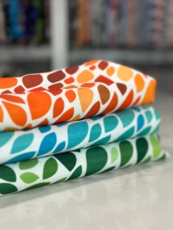 Locus Leaf (Poly Print) Table Linen in Orange