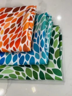 Locus Leaf (Poly Print) Table Linen in Orange