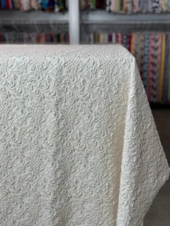 Lucia Jacquard Table Linen in Ivory
