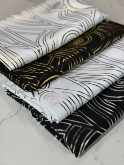 Luxor (Metallic Print) Table Linen in Black and Silver