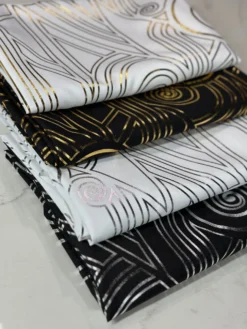 Luxor (Metallic Print) Table Linen in Black and Silver
