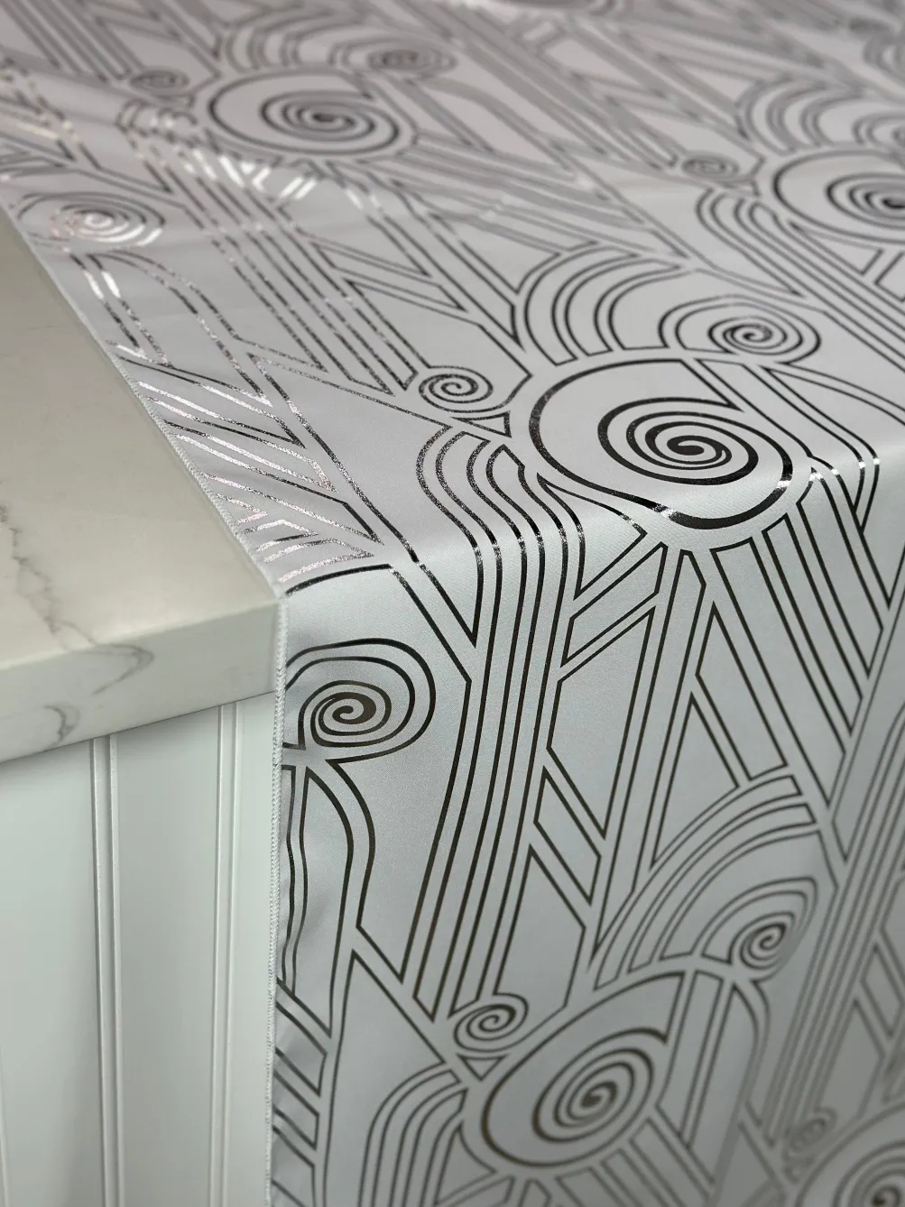 Luxor (Metallic Print) Table Linen in White and Silver