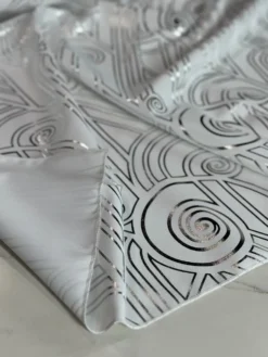Luxor (Metallic Print) Table Linen in White and Silver