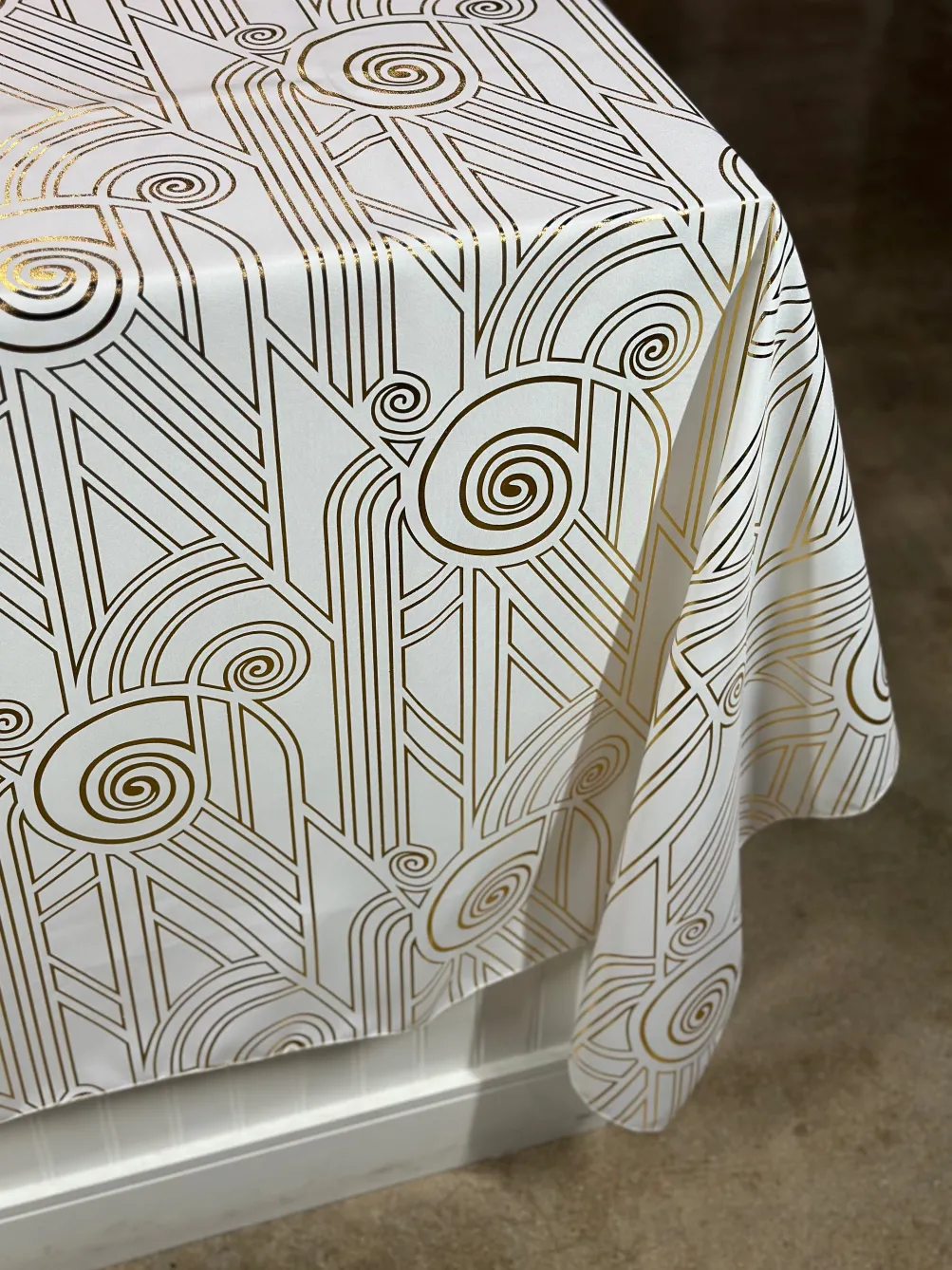 Luxor (Metallic Print) Table Linen in White and Gold