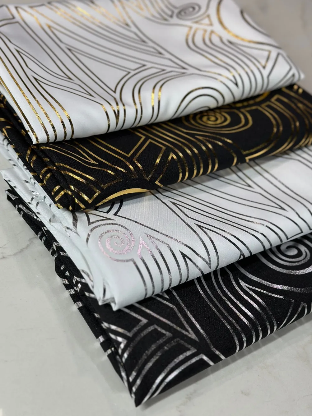 Luxor (Metallic Print) Table Linen in White and Gold