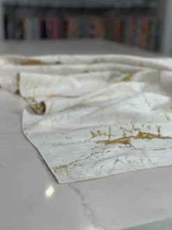 Marble Jacquard Table Linen in Gold