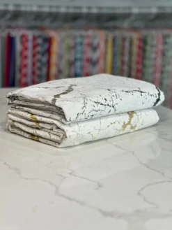 Marble Jacquard Table Linen in Gold