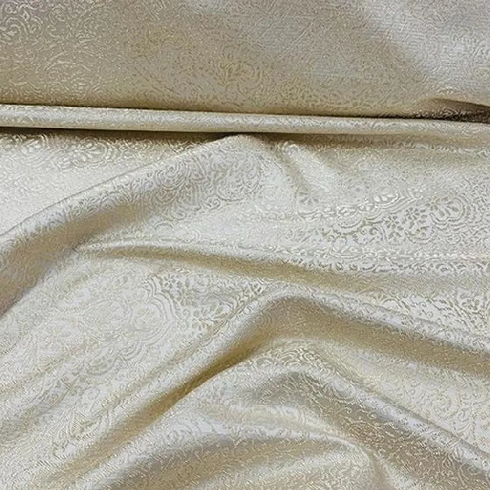 Miramar Jacquard Table Linen in Ivory and Gold