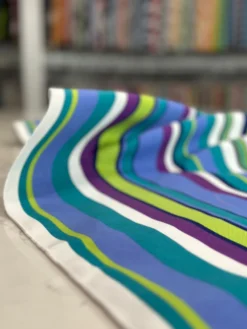 Multi-Color Stripe Table Linen in Grape