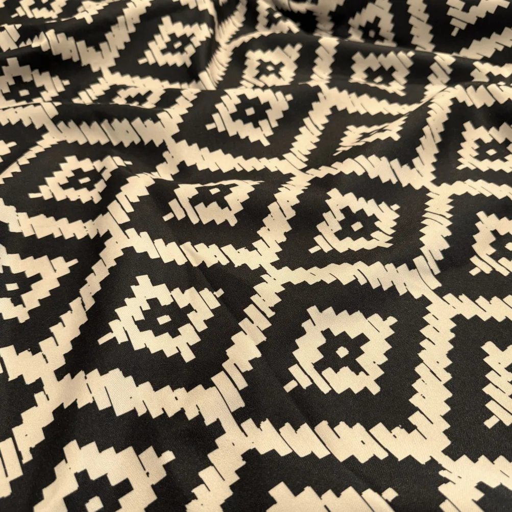 Onyx (Poly Print) Table Linen in Black / Taupe