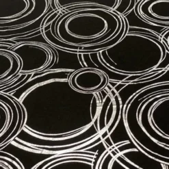 Orbit (Metallic Print) Table Linen in Black and Silver