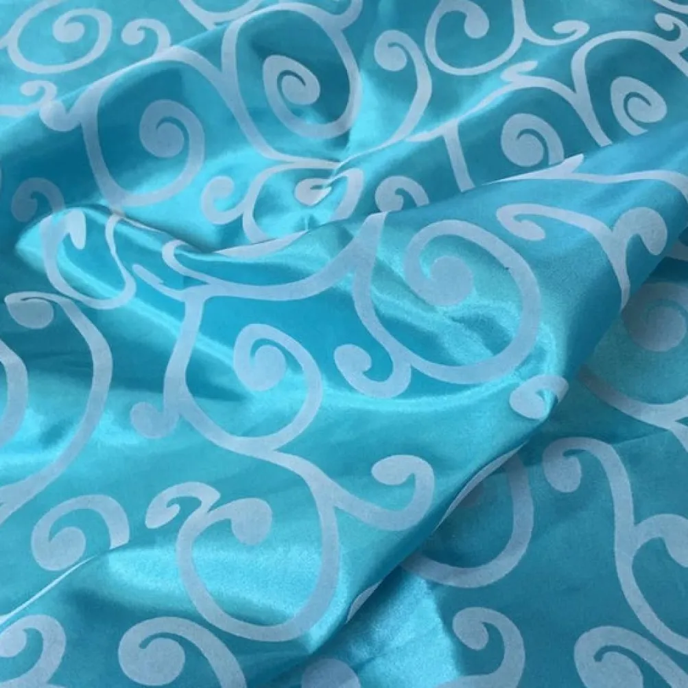 Swirl Flocking Taffeta Table Linen in Silver on Turquoise