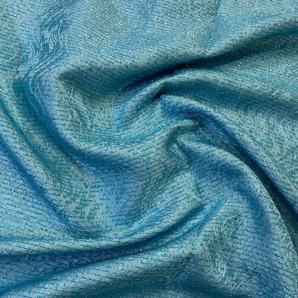 Twinkle Tensil Table Linen in Turquoise