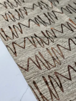 Zion Jacquard Table Linen in Copper