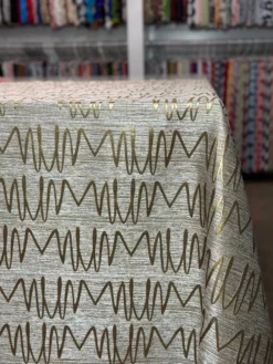 Zion Jacquard Table Linen in Gold
