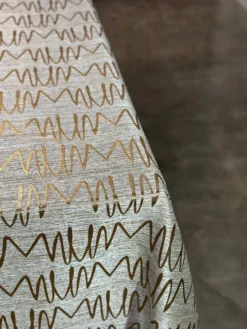 Zion Jacquard Table Linen in Gold
